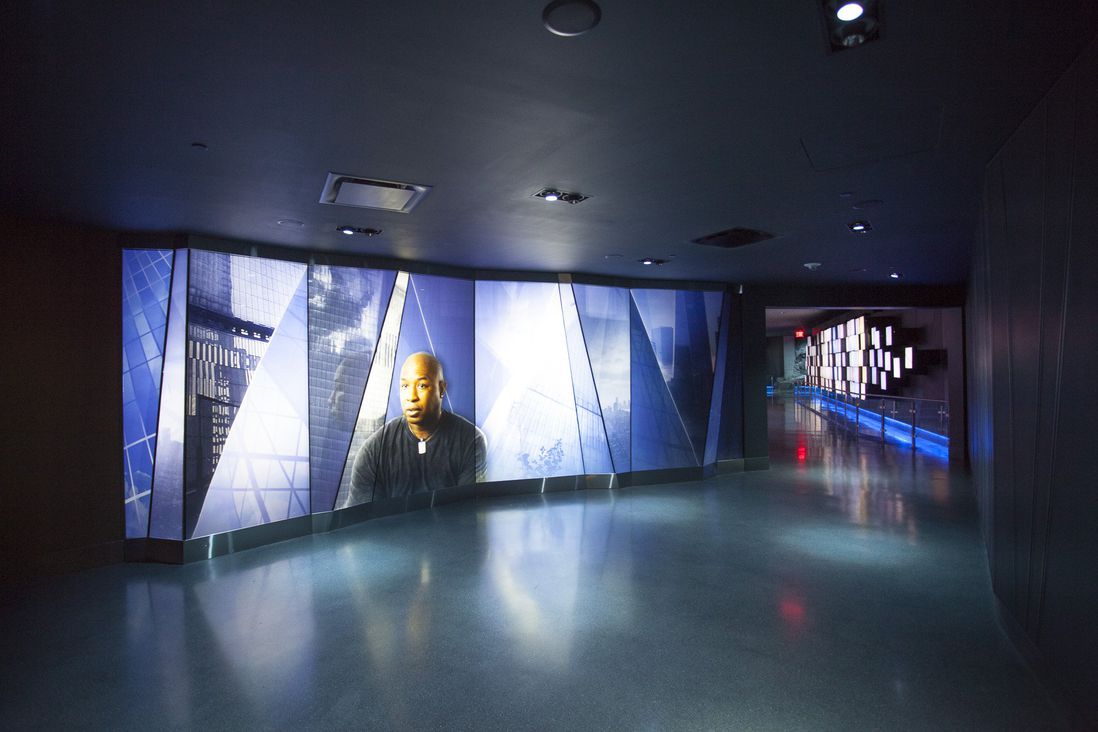 Then there's a long passageway with videos of people who constructed and work in the new 1 WTC.<br/>